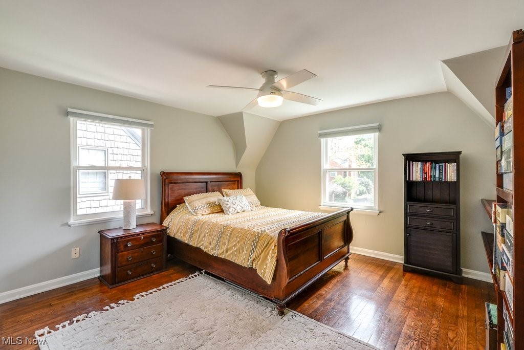 2340 Canterbury Road University Heights, OH 44118 - Photo 17 of 29 Bedroom with baseboards, a ceiling fan, wood finished floors, and lofted ceiling