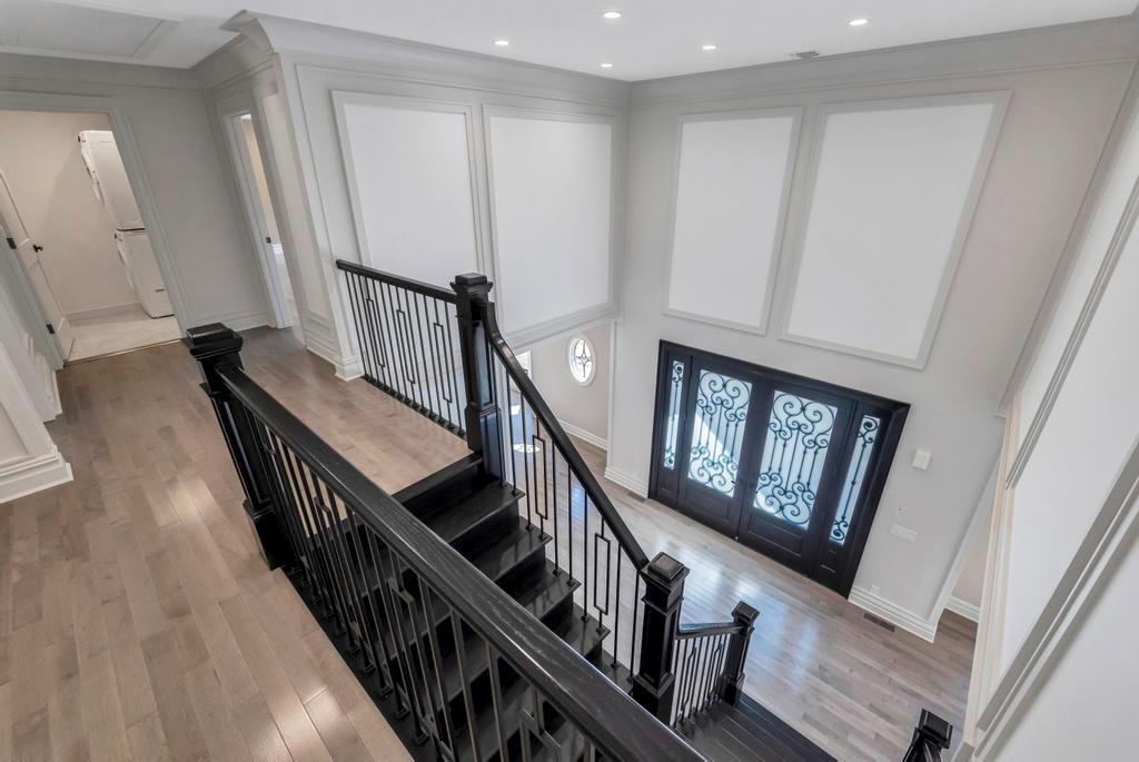 589 Old Bridge Road Northport, NY 11768 - Photo 27 of 40 a view of an entryway with wooden floor and stairs
