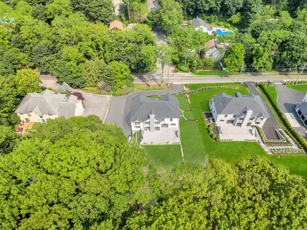 589 Old Bridge Road Northport, NY 11768 - Photo 7 of 40 an aerial view of a house with pool garden and outdoor seating