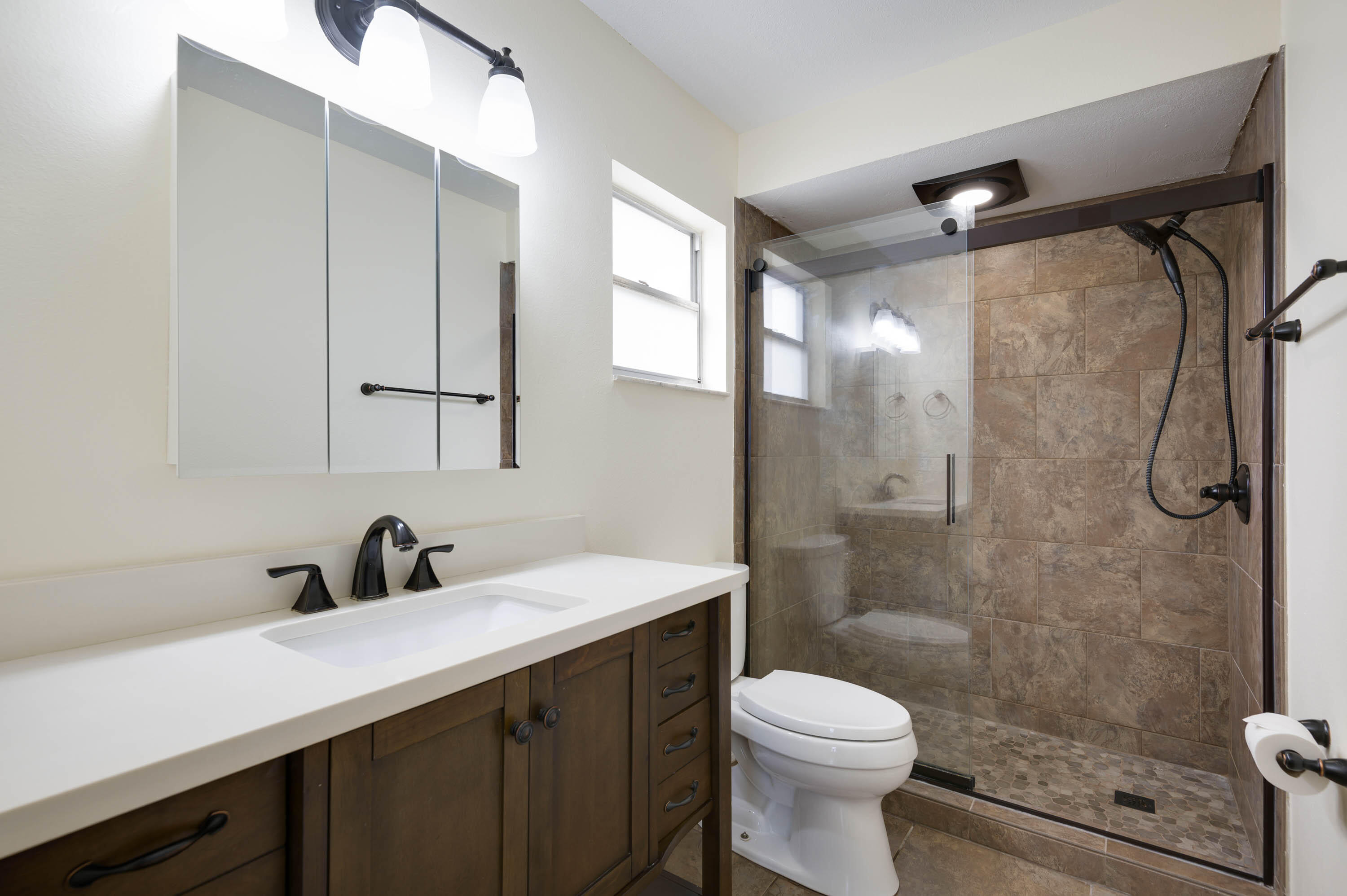 2331 Scotland Road Cocoa, FL 32926 - Photo 13 of 20 a bathroom with a sink toilet and shower