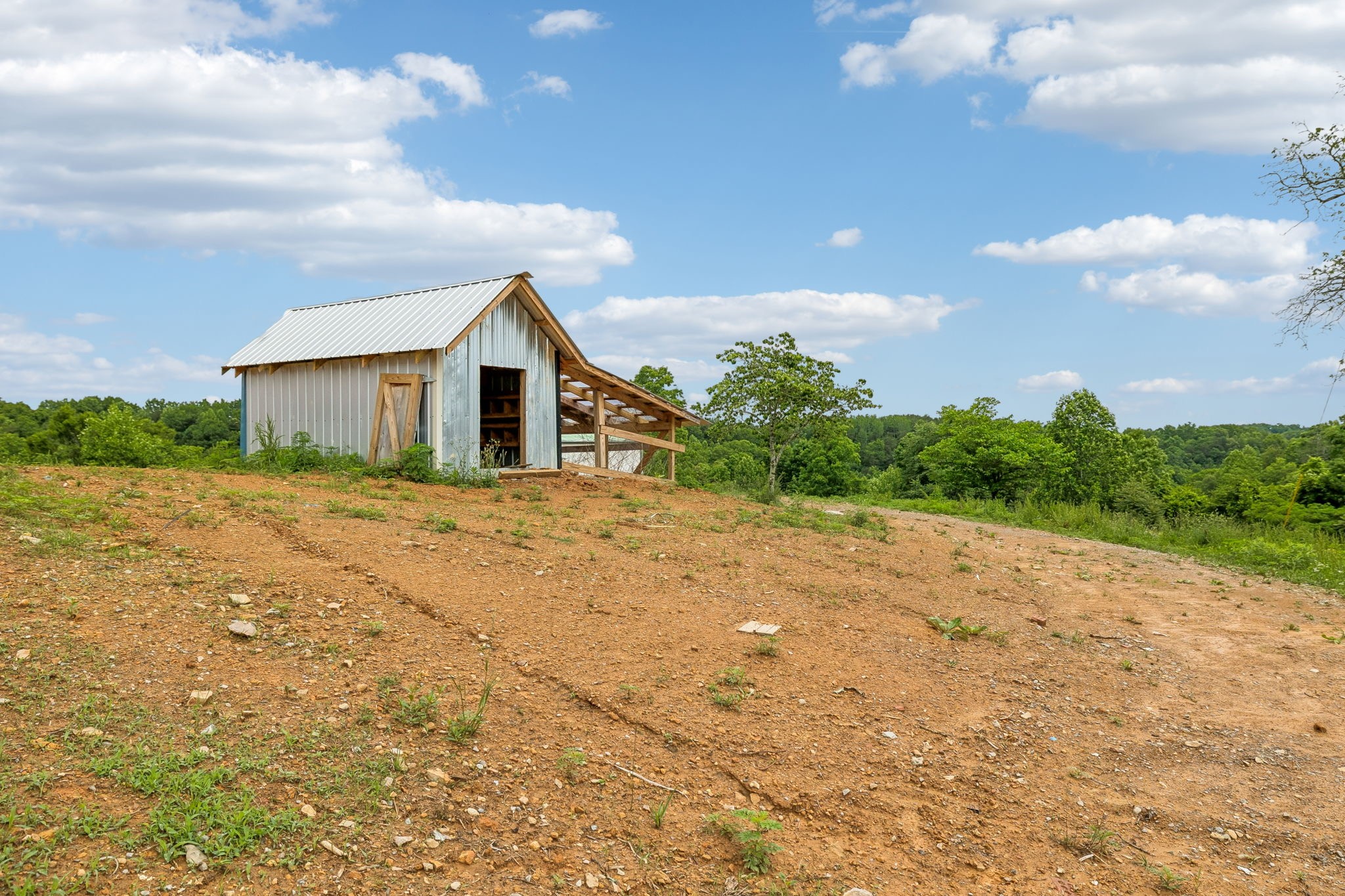 6701 McCormick Ridge Road Whitleyville, TN 38588 - Photo 57 of 63 a view of a house with a yard