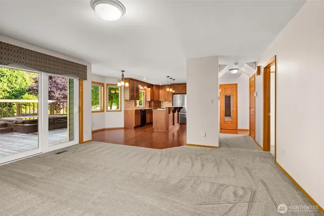 a view of livingroom with furniture and an entryway