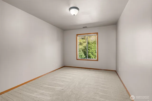 an empty room with window