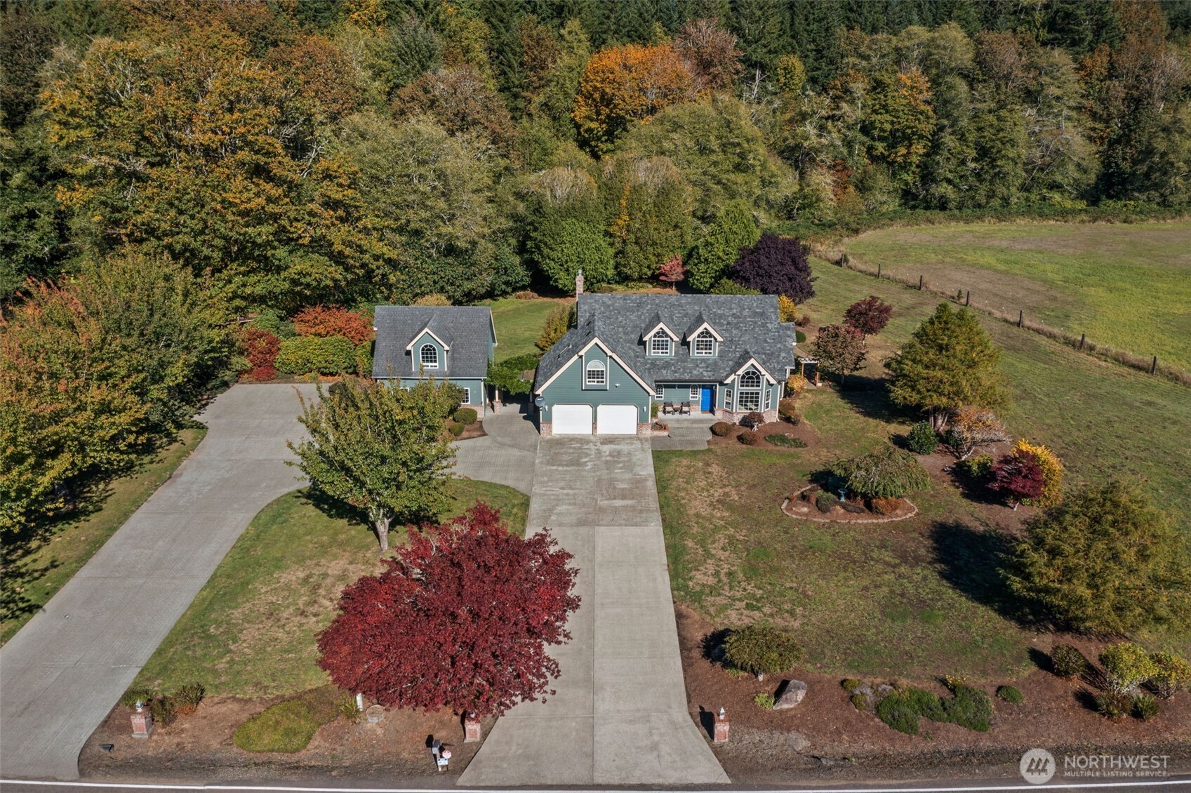 125 Mill Creek Road Raymond, WA 98577 - Photo 3 of 40 an aerial view of a house with a yard
