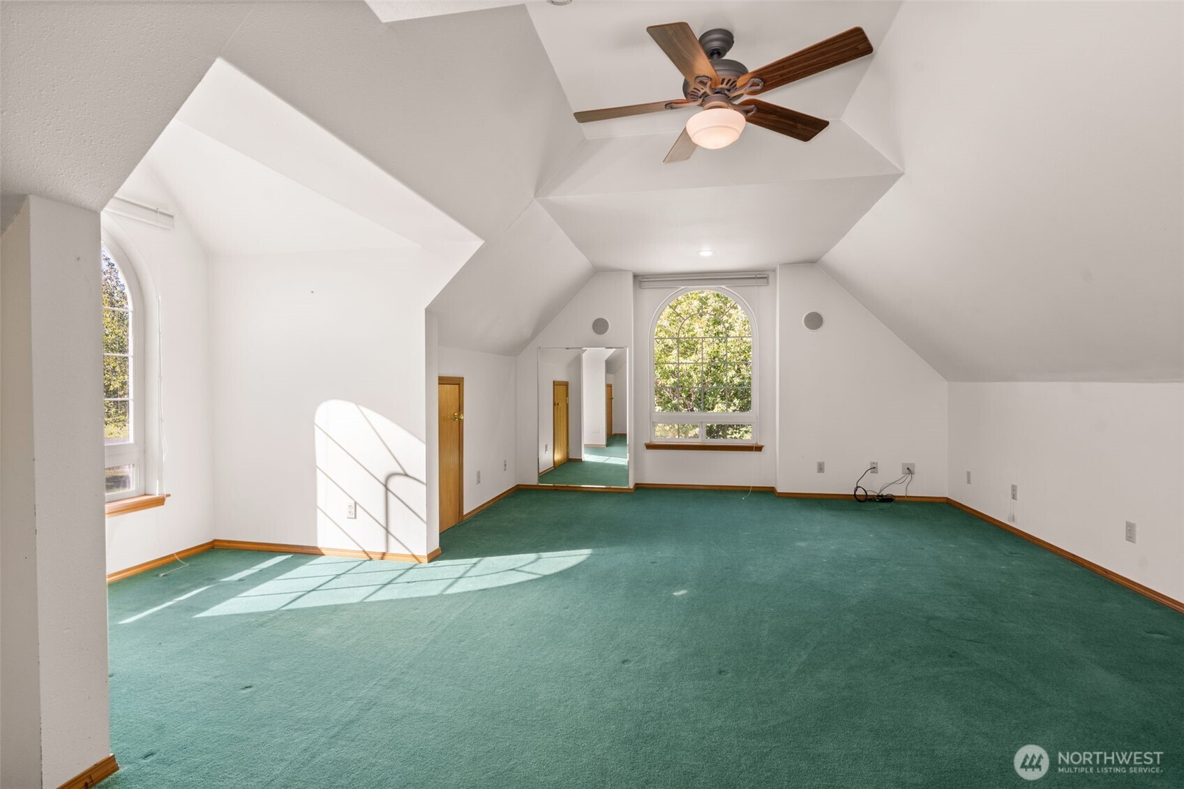 125 Mill Creek Road Raymond, WA 98577 - Photo 33 of 40 a view of a room with window and a ceiling fan