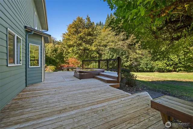 a view of house with yard