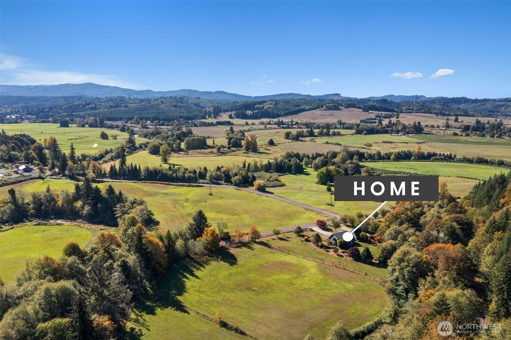 125 Mill Creek Road Raymond, WA 98577 - Photo 5 of 40 a view of a city with mountains in the background
