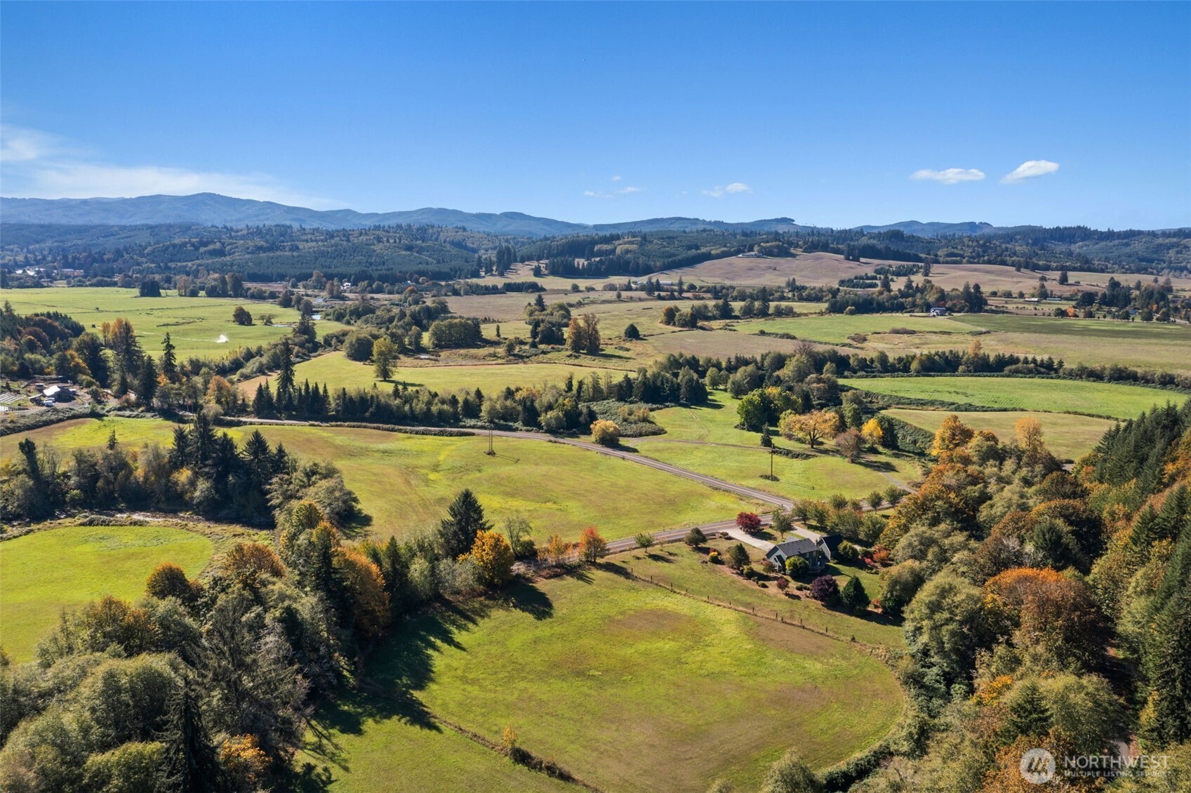 125 Mill Creek Road Raymond, WA 98577 - Photo 6 of 40 a view of a city with mountains in the background