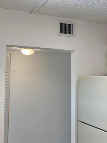 a view of a utility room with a sink