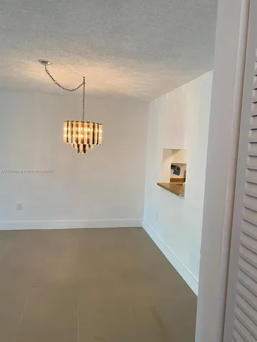 a view of hallway with shower