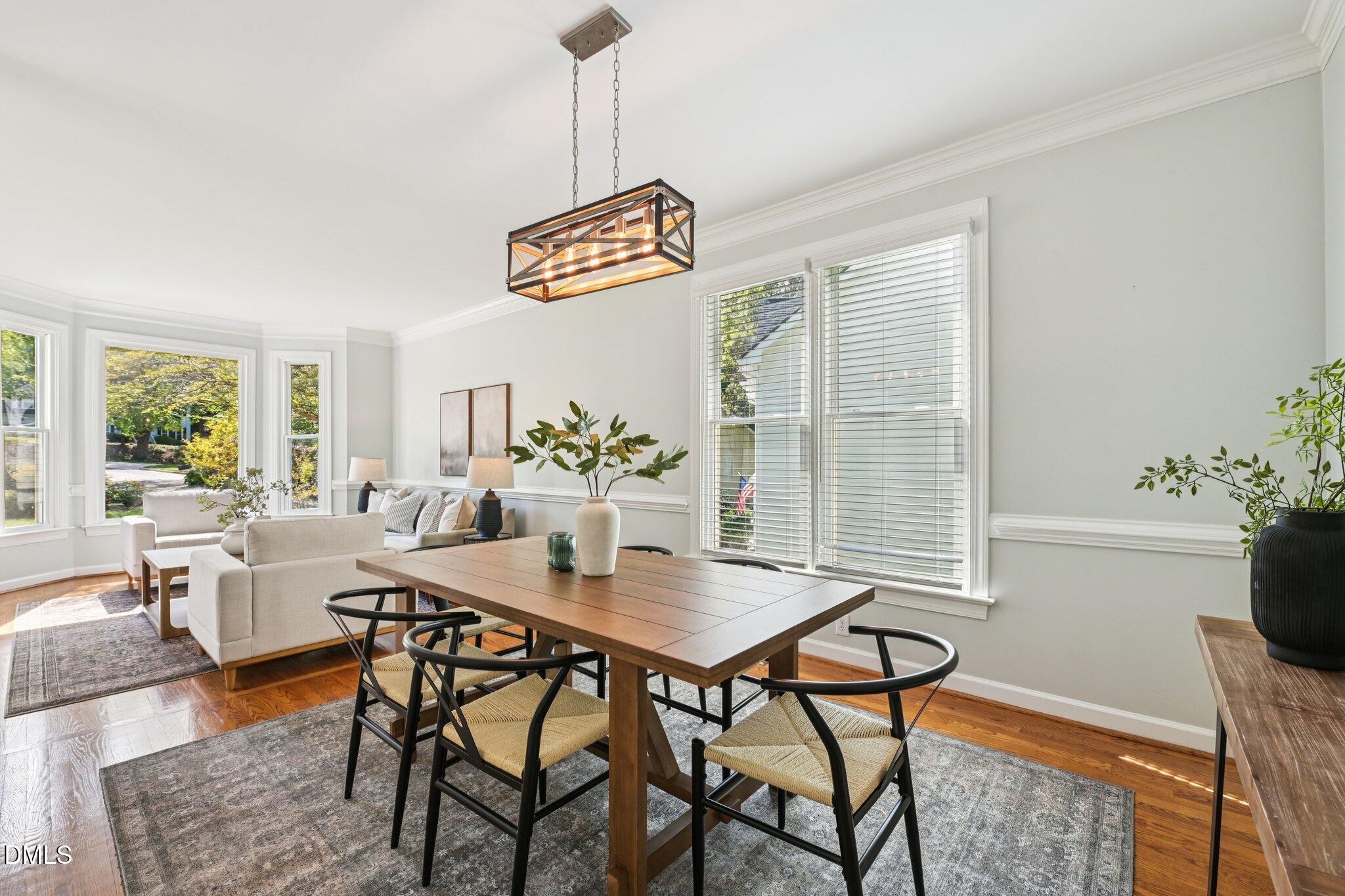 3008 Walton Heath Court Raleigh, NC 27612 - Photo 13 of 57 a view of a dining room with furniture window and outside view