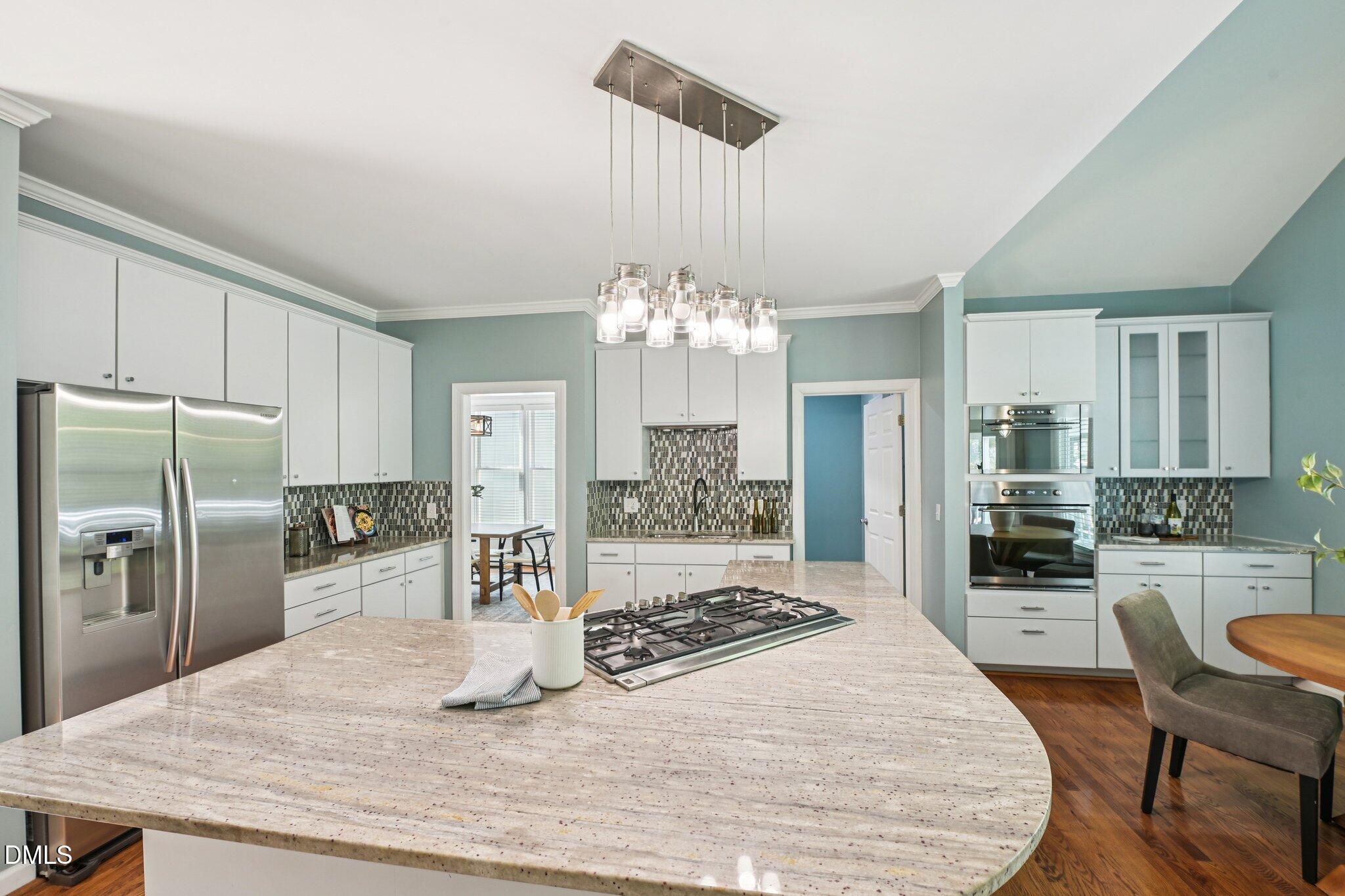 3008 Walton Heath Court Raleigh, NC 27612 - Photo 14 of 57 a kitchen with refrigerator and window