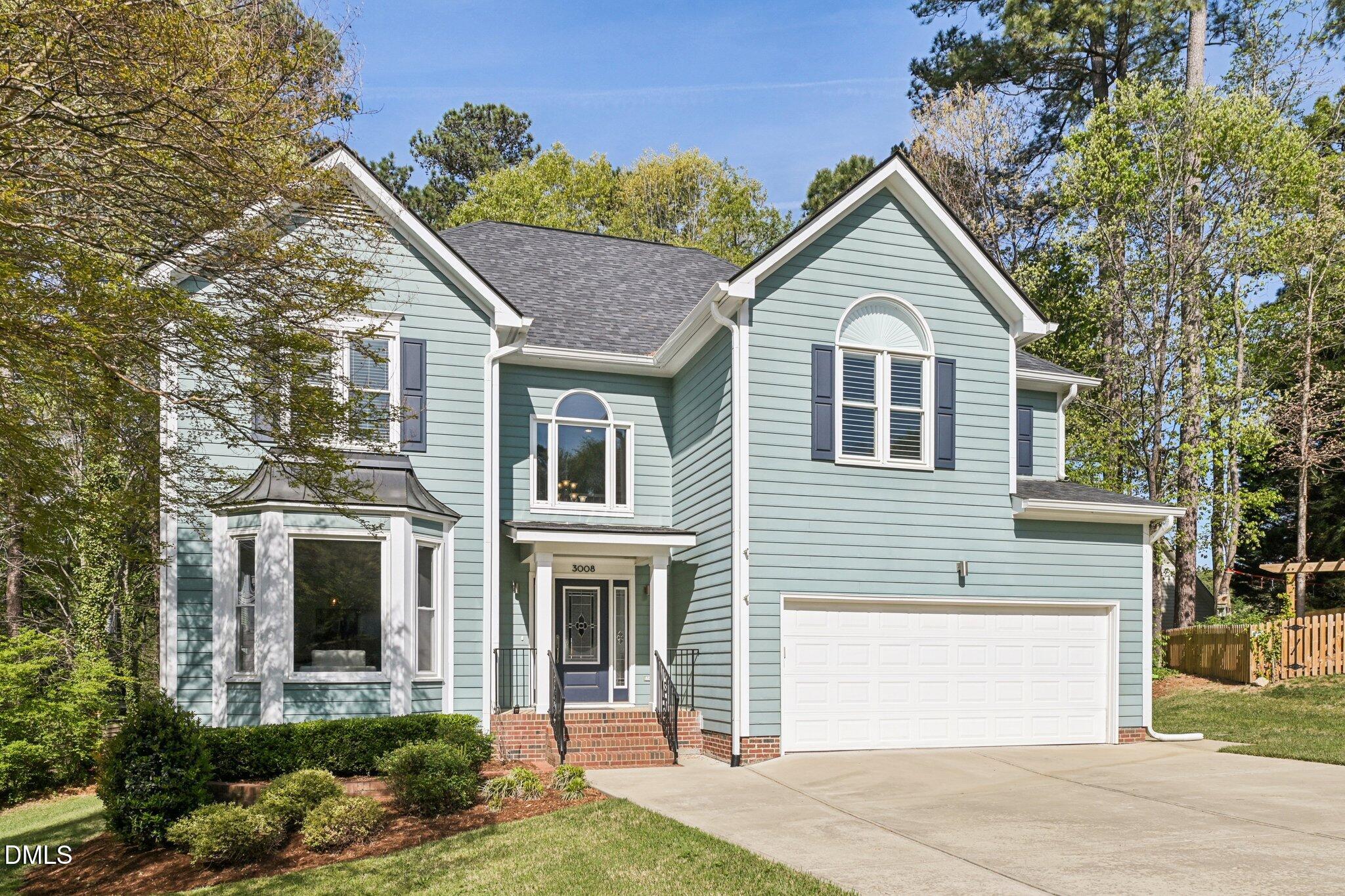 3008 Walton Heath Court Raleigh, NC 27612 - Photo 2 of 57 a view of a house with a yard