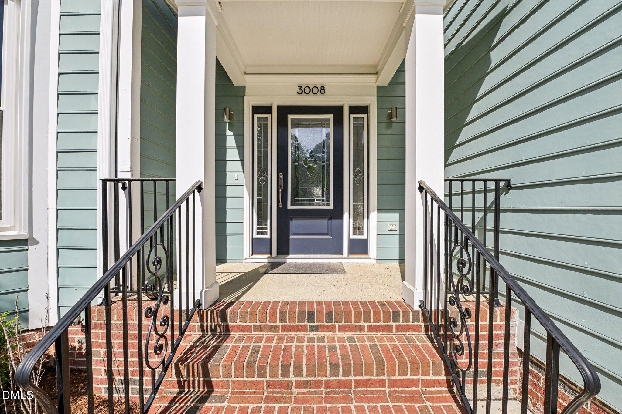 3008 Walton Heath Court Raleigh, NC 27612 - Photo 3 of 57 a view of balcony with wooden floor and floor to ceiling window