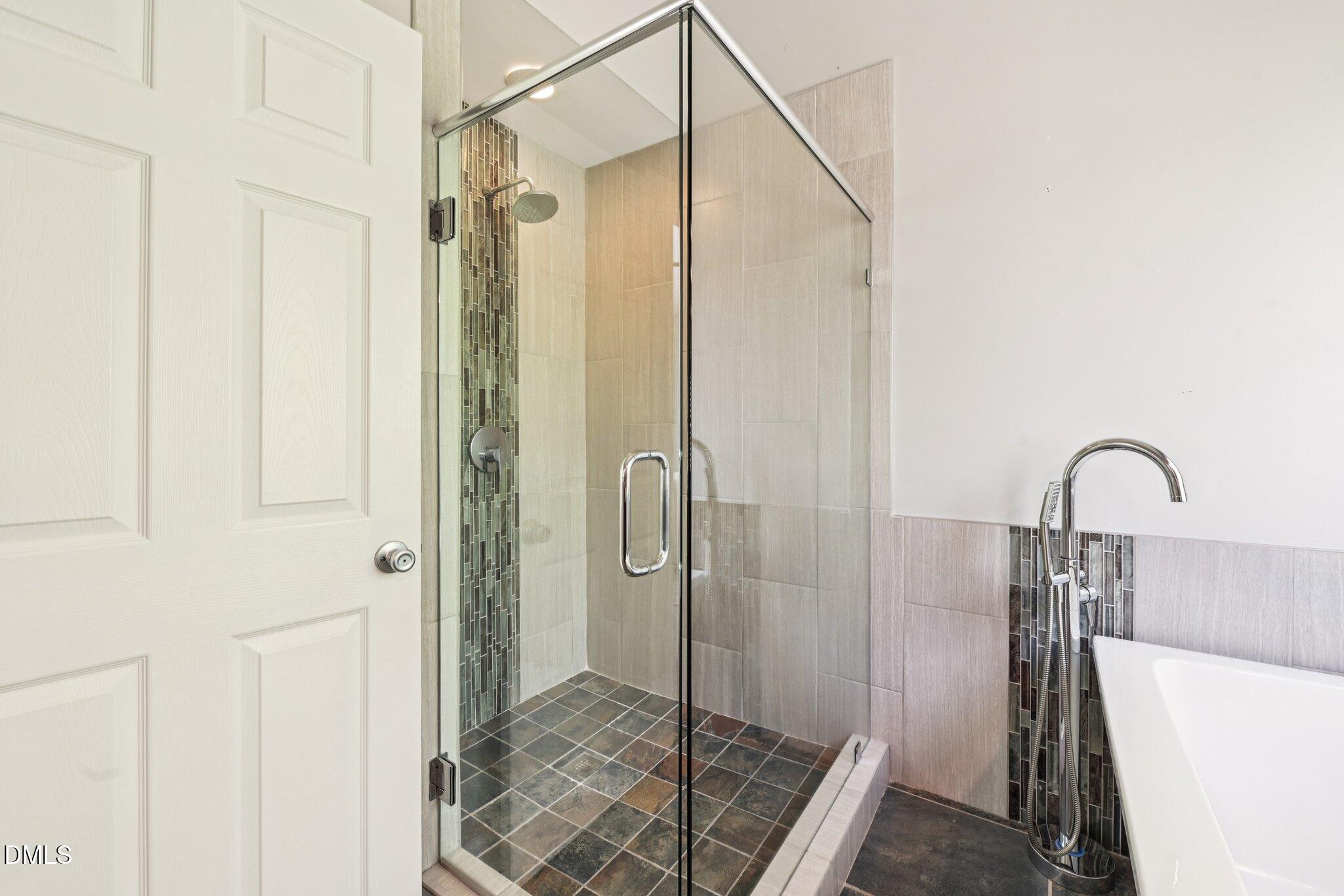 3008 Walton Heath Court Raleigh, NC 27612 - Photo 32 of 57 a bathroom with a shower