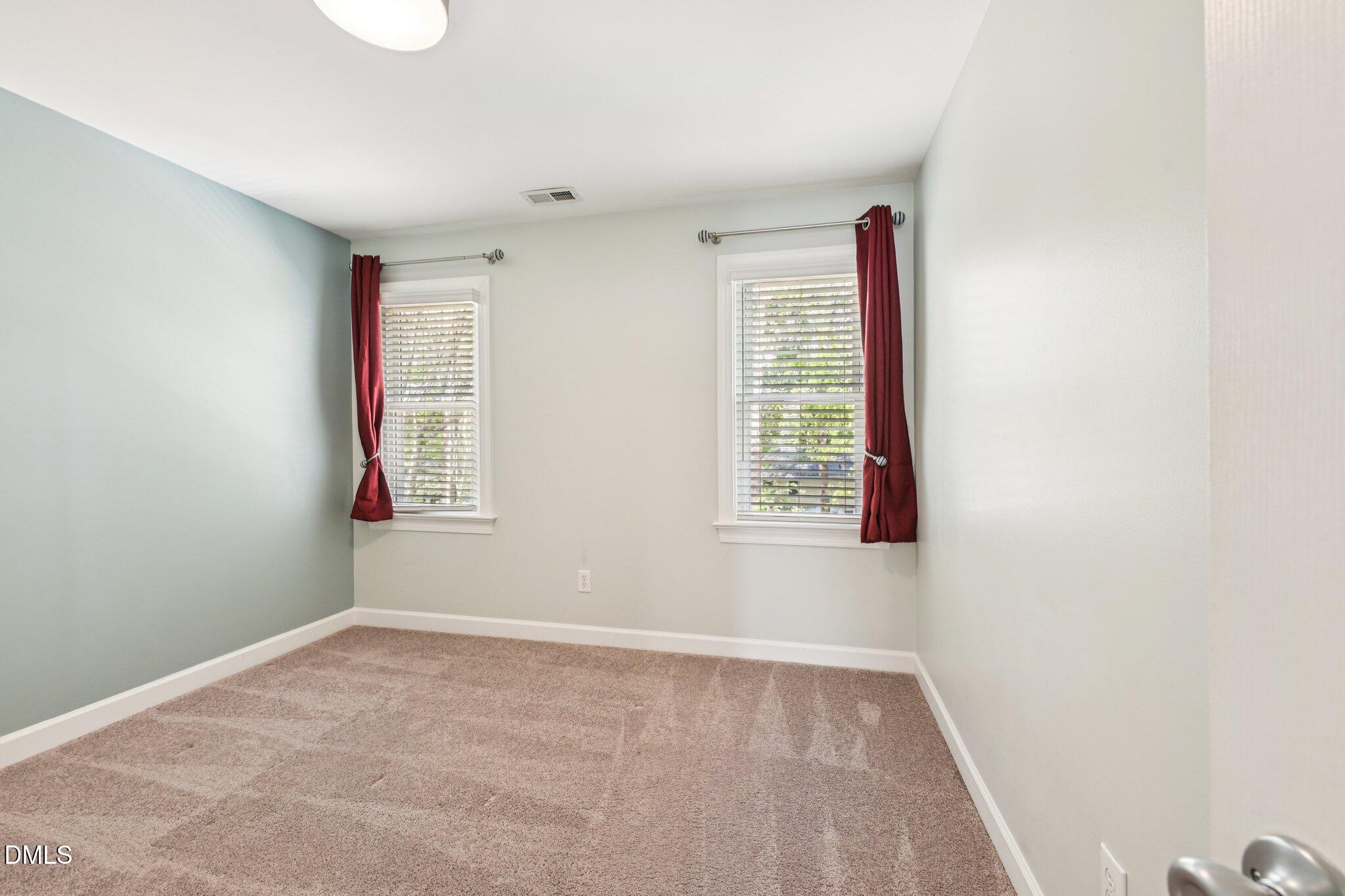 3008 Walton Heath Court Raleigh, NC 27612 - Photo 38 of 57 a view of an empty room with a window