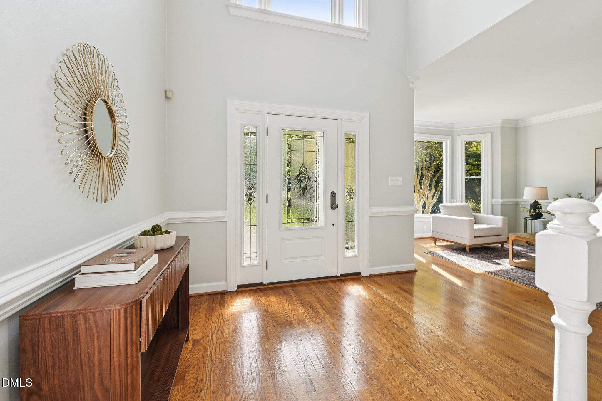 3008 Walton Heath Court Raleigh, NC 27612 - Photo 4 of 57 a view of room with workspace and wooden floor