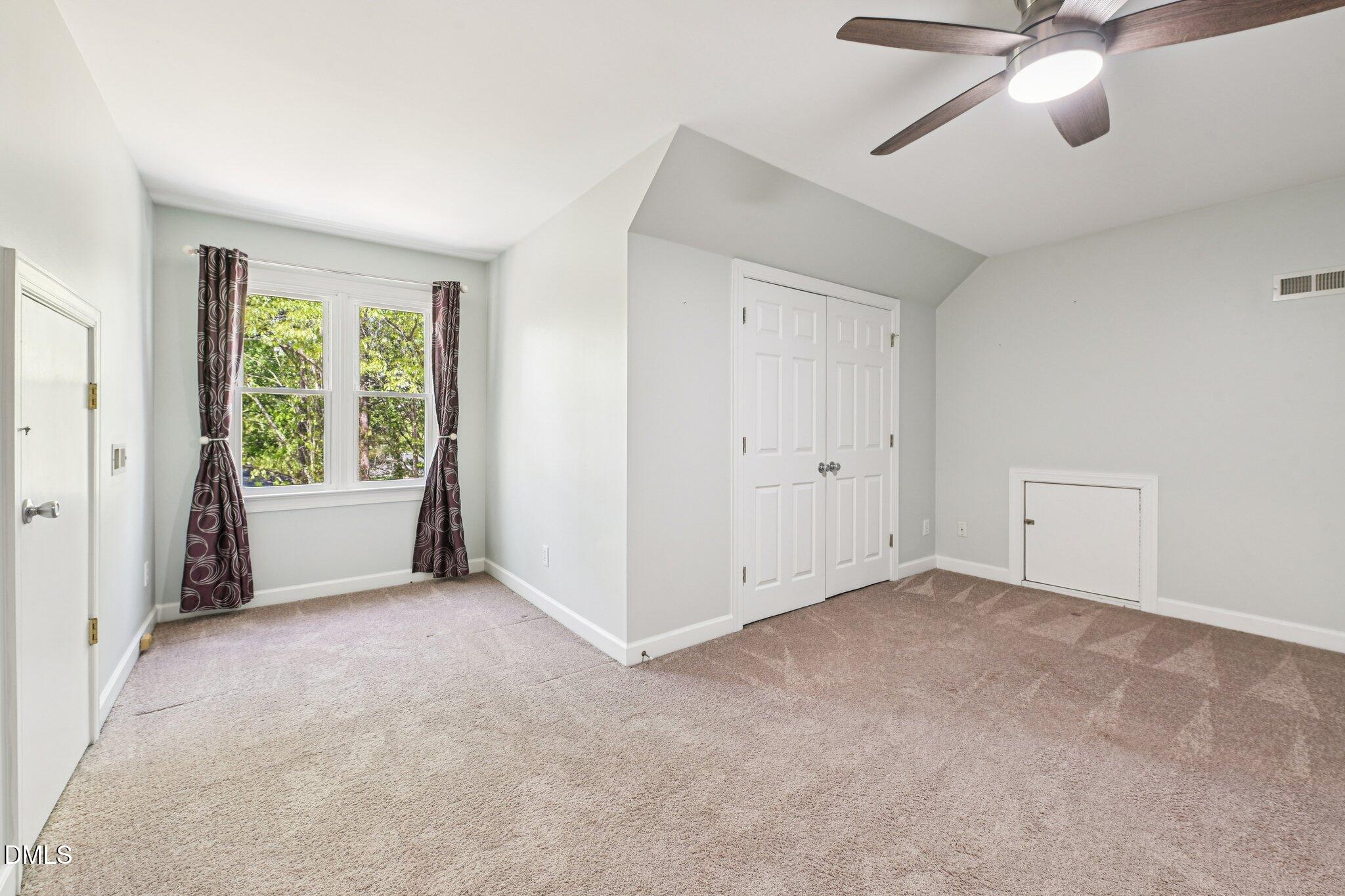 3008 Walton Heath Court Raleigh, NC 27612 - Photo 44 of 57 a view of an empty room with a window