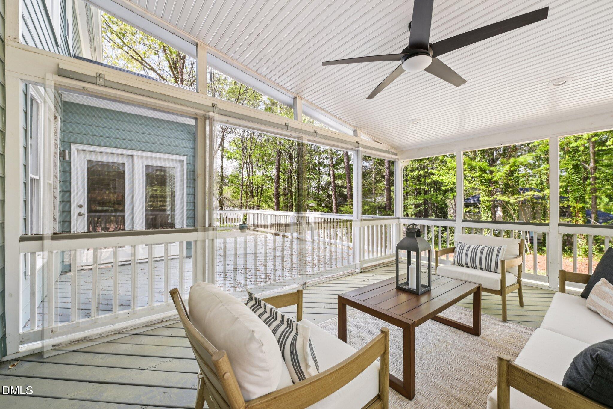3008 Walton Heath Court Raleigh, NC 27612 - Photo 49 of 57 a view of a patio with a table and chairs