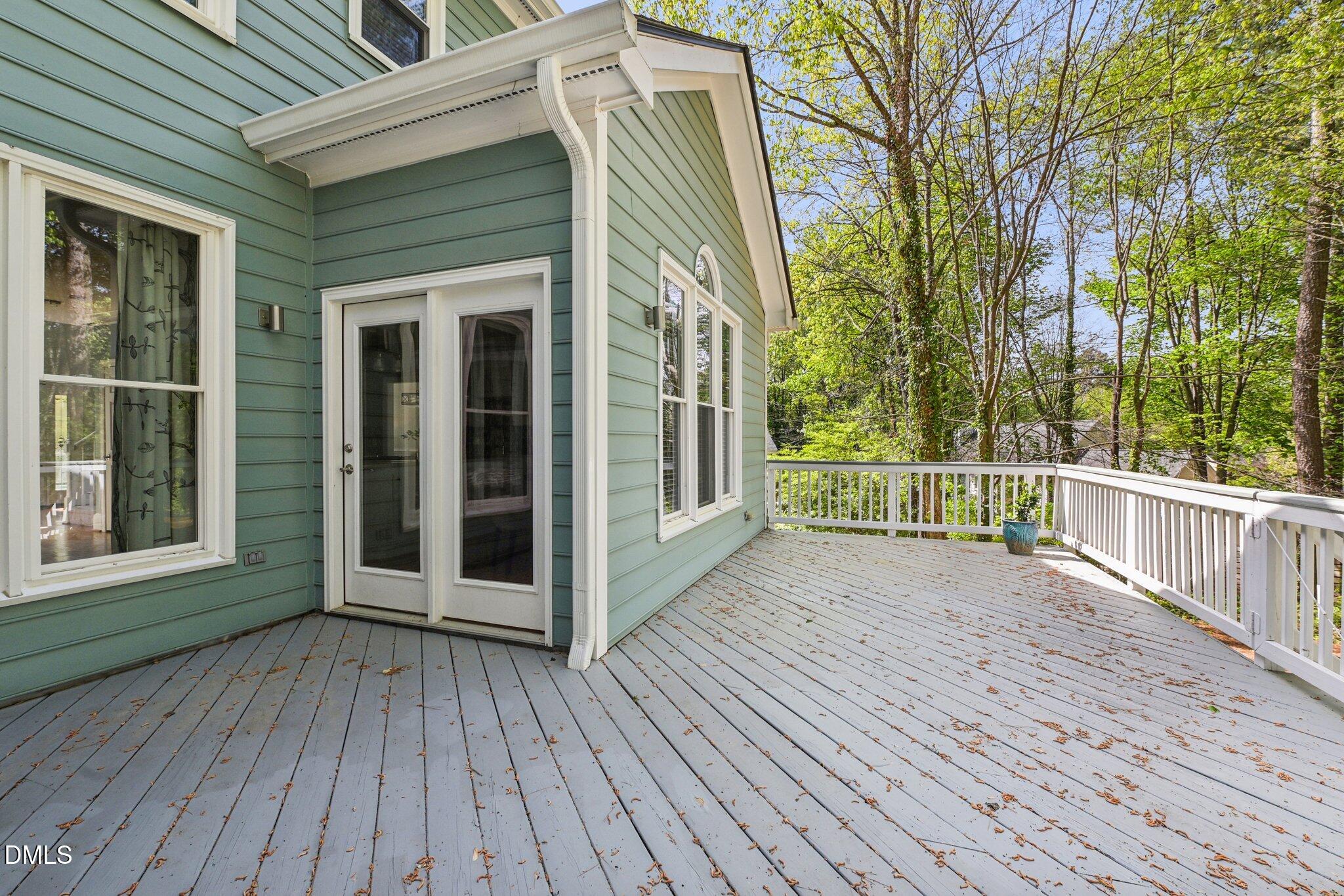 3008 Walton Heath Court Raleigh, NC 27612 - Photo 51 of 57 a view of a house with a deck