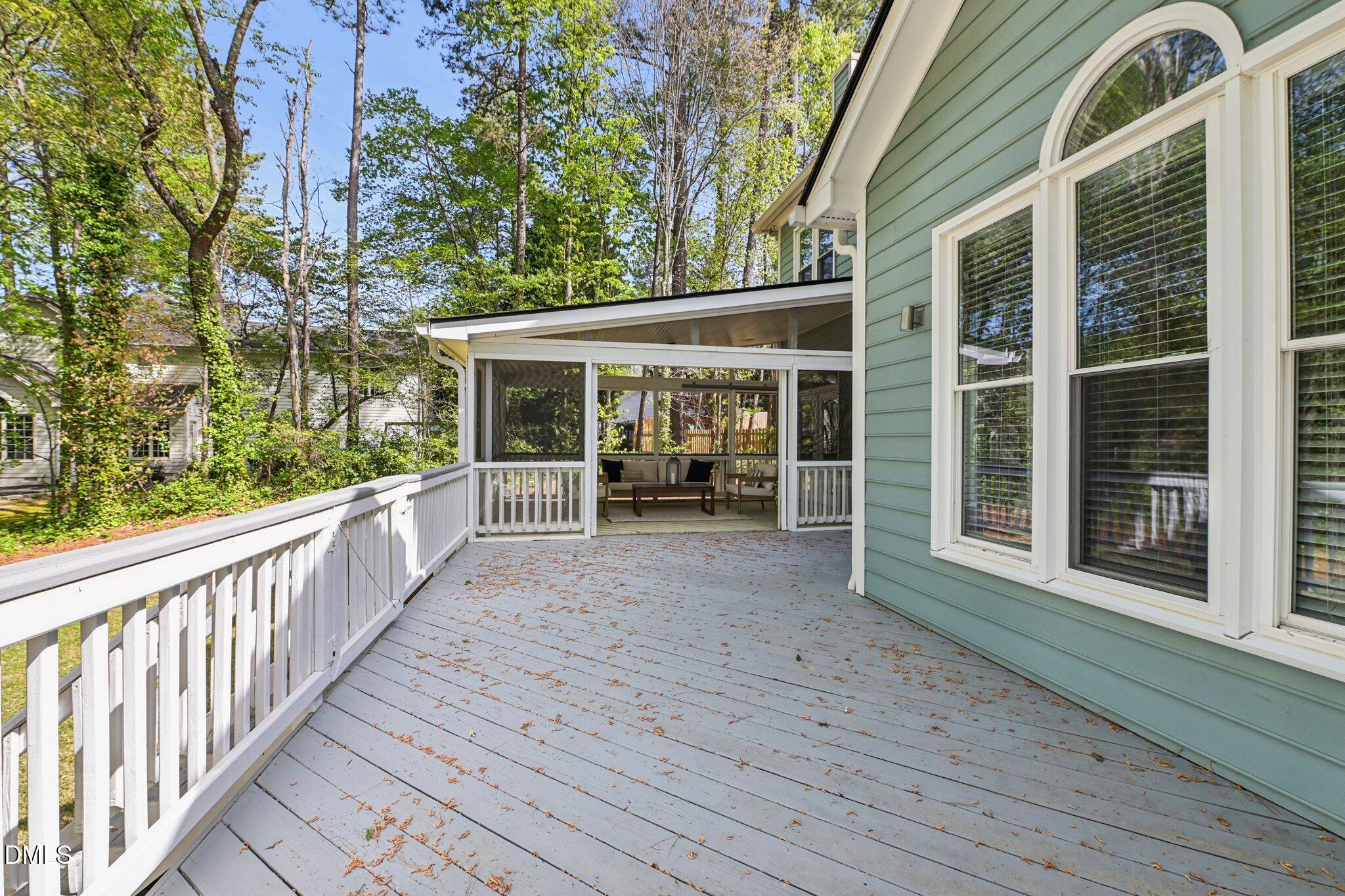 3008 Walton Heath Court Raleigh, NC 27612 - Photo 52 of 57 a view of a house with porch and wooden floor