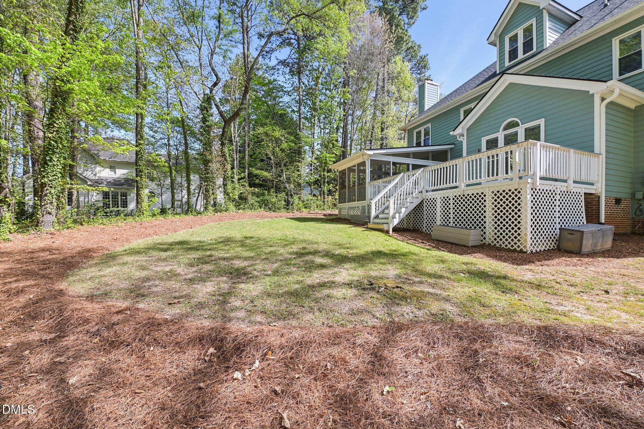 3008 Walton Heath Court Raleigh, NC 27612 - Photo 54 of 57 a front view of a house with garden