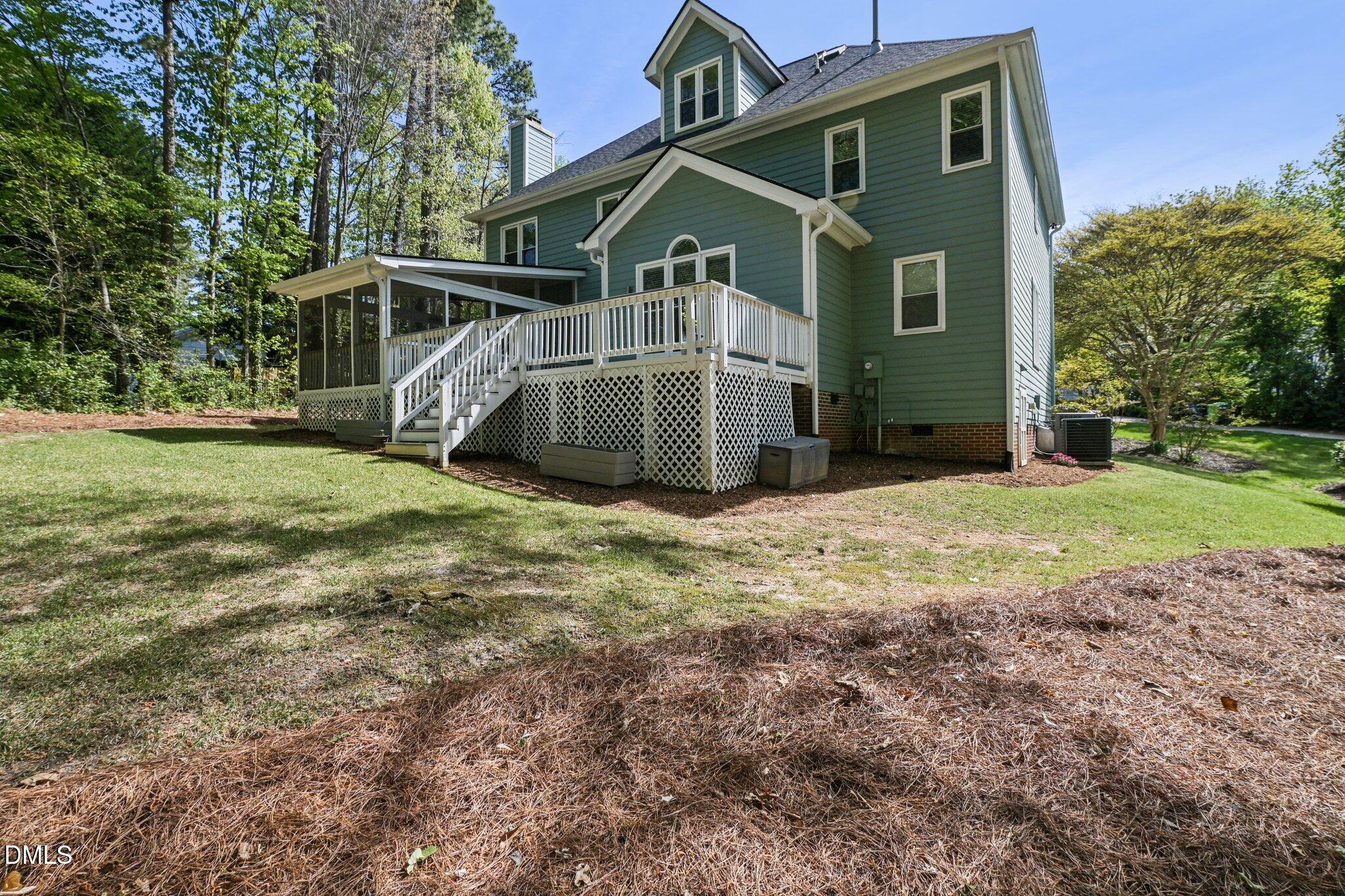 3008 Walton Heath Court Raleigh, NC 27612 - Photo 55 of 57 a view of a house with a yard
