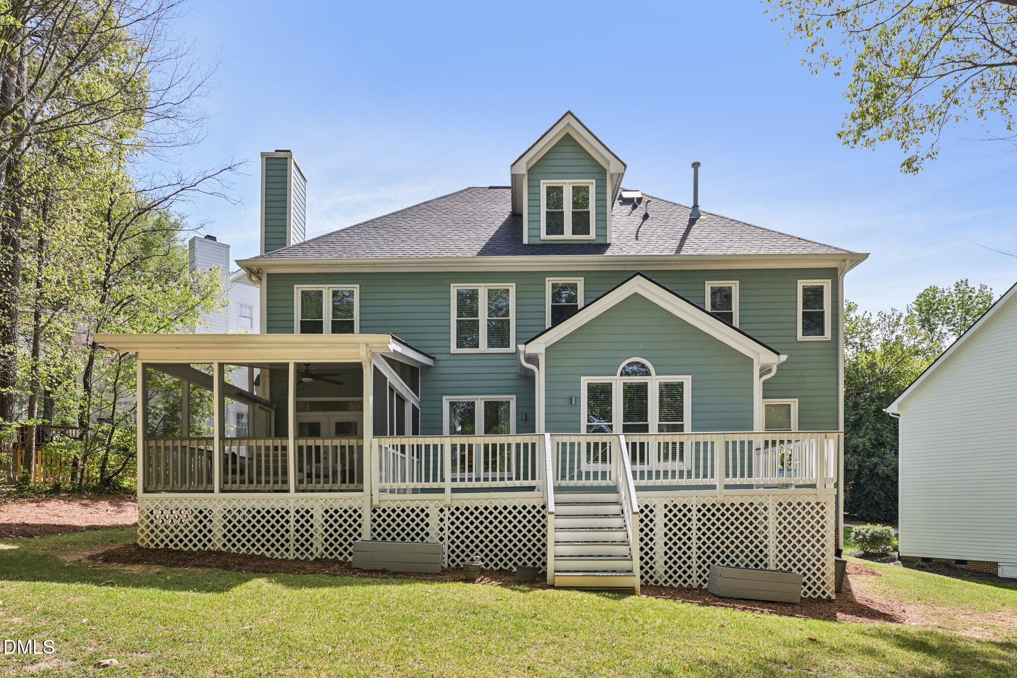 3008 Walton Heath Court Raleigh, NC 27612 - Photo 57 of 57 a front view of a house with a garden