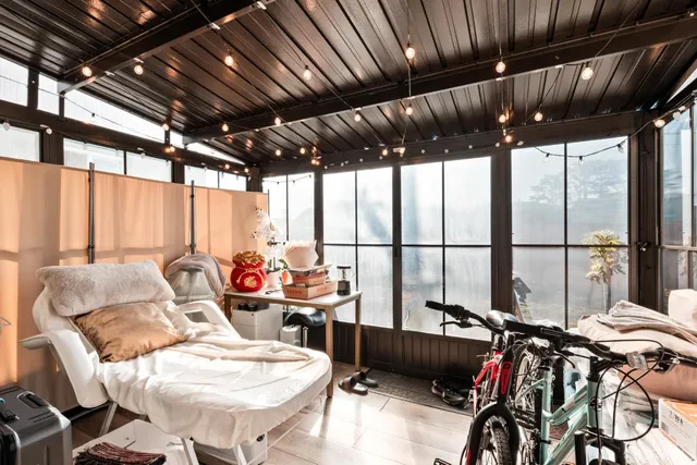 a white toilet sitting next to a bathroom sink