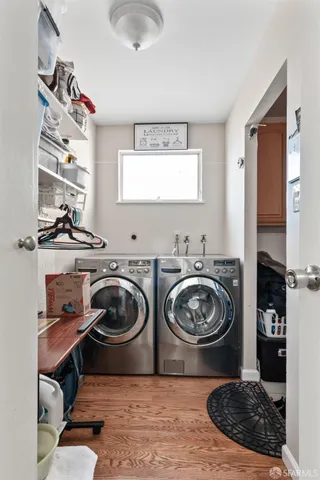 a bedroom with a bed and flat screen tv
