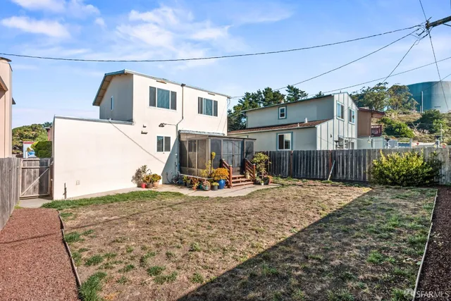 a aerial view of a house with swimming pool