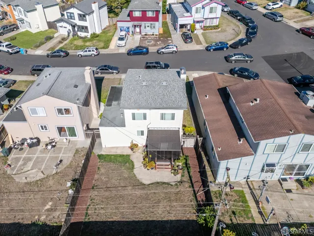 a view of a street with cars