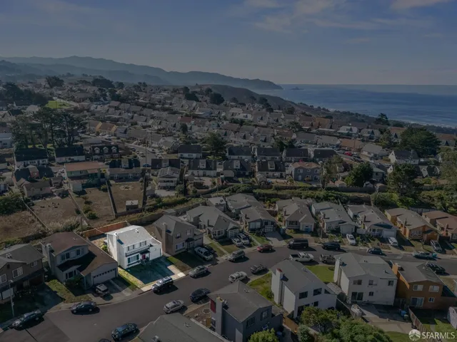 a view of a lake with mountains in the background