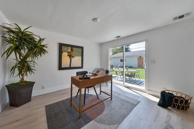 a view of empty room with windows