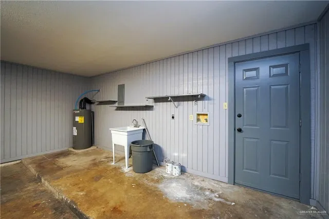 a view of a house with a yard and roof