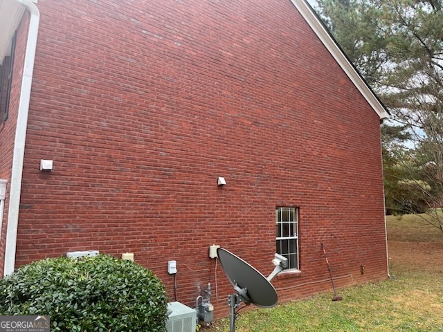 5793 Wind Gate Lane Lithonia, GA 30058 - Photo 23 of 24 a backyard of a house with chairs