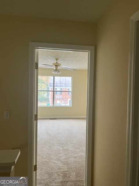 5793 Wind Gate Lane Lithonia, GA 30058 - Photo 3 of 24 a view of an empty room and window