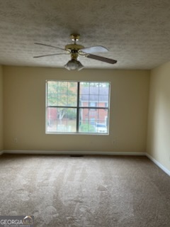 5793 Wind Gate Lane Lithonia, GA 30058 - Photo 6 of 24 an empty room with a window