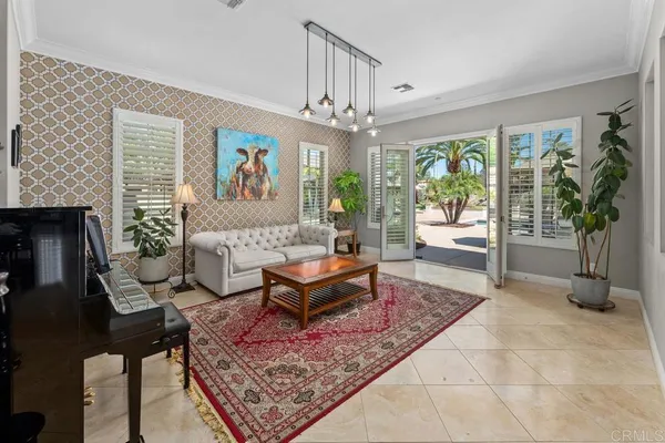 a view of a backyard with sitting area