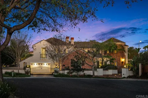 a outdoor space with patio fireplace and couches
