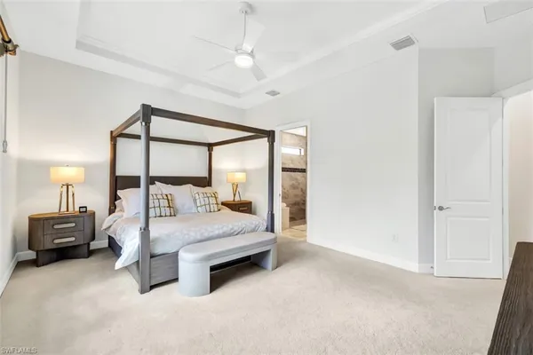 a bedroom with a bed and a walk in closet