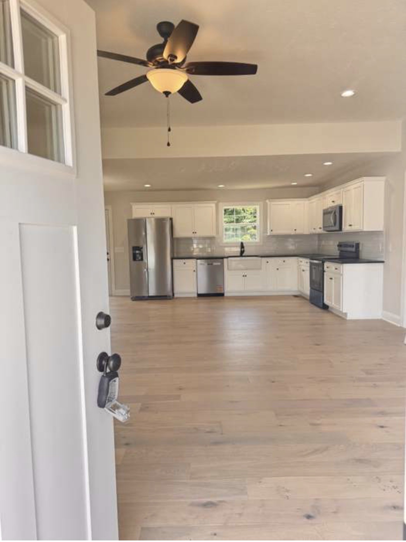 2105 Maple Grove Road Cadiz, KY 42211 - Photo 2 of 13 a view of a living room with a ceiling fan