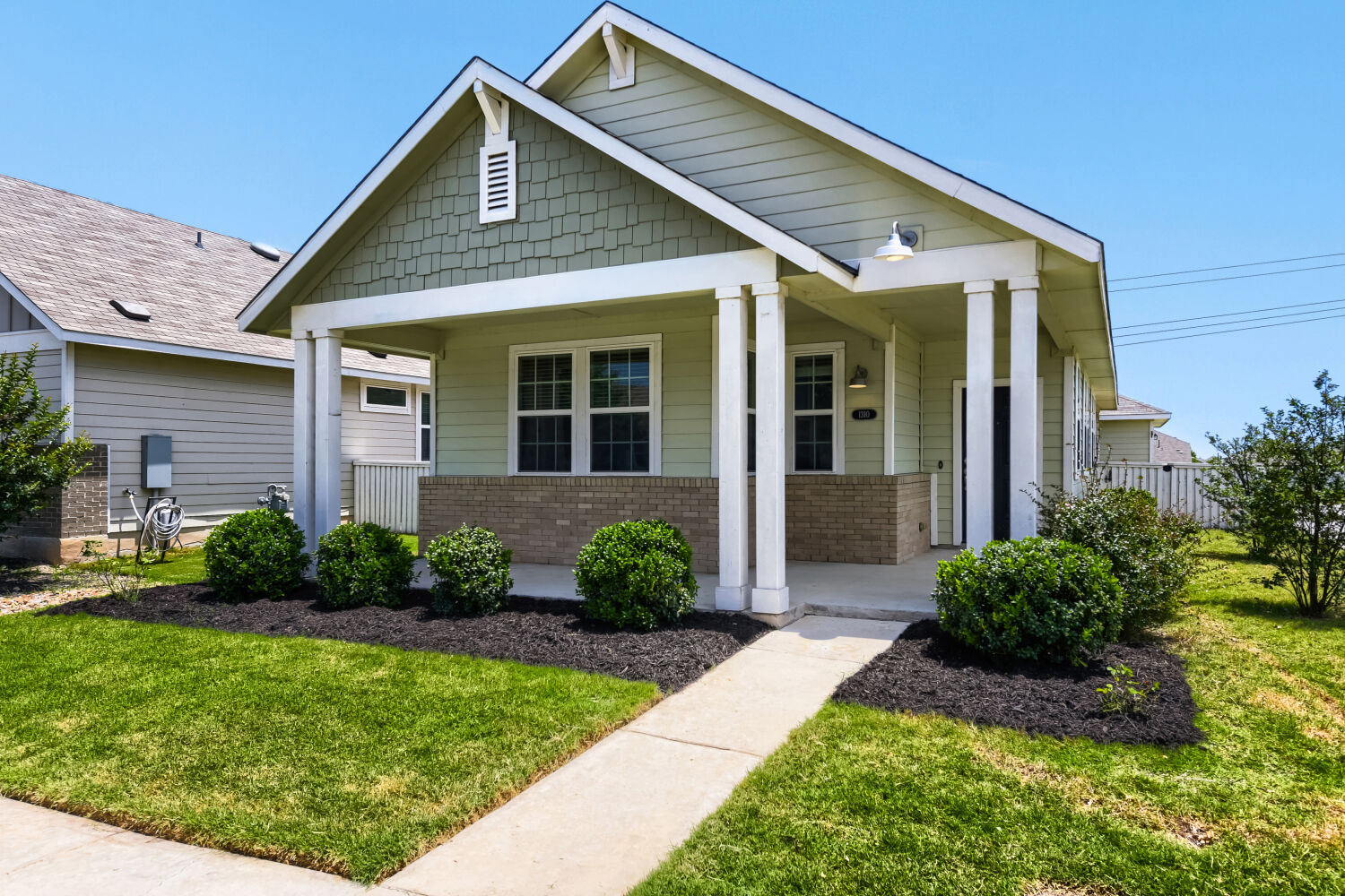 1310 Goforth Road Kyle, TX 78640 - Photo 2 of 24 a front view of a house with garden
