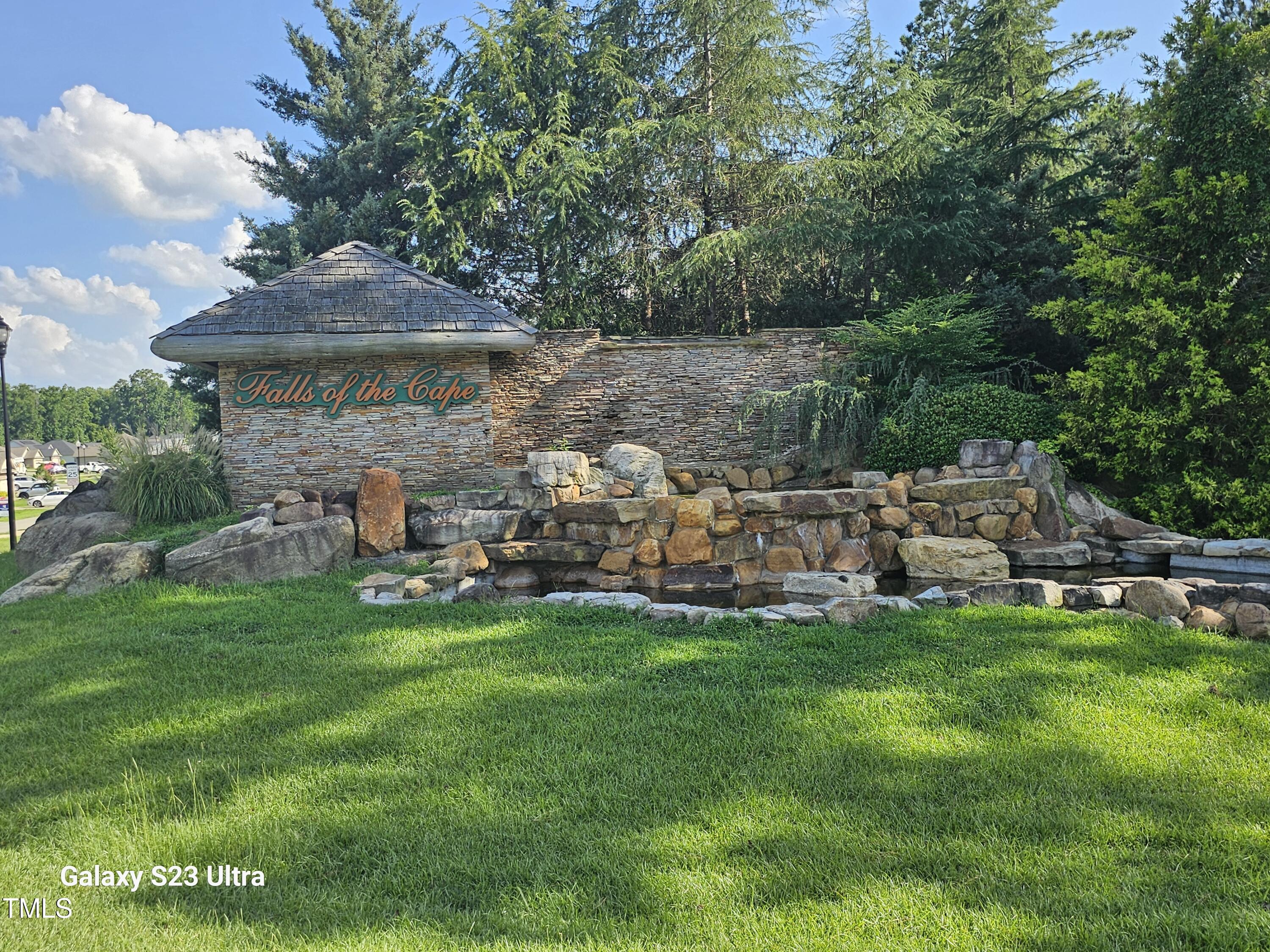 20 Streamline Court Lillington, NC 27546 - Photo 38 of 46 a view of a garden with an outdoor seating