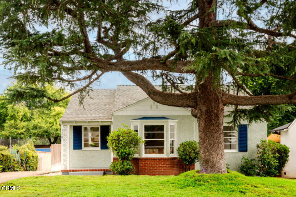 126 West Pine Street Altadena, CA 91001 - Photo 1 of 21 a front view of a house with yard and green space