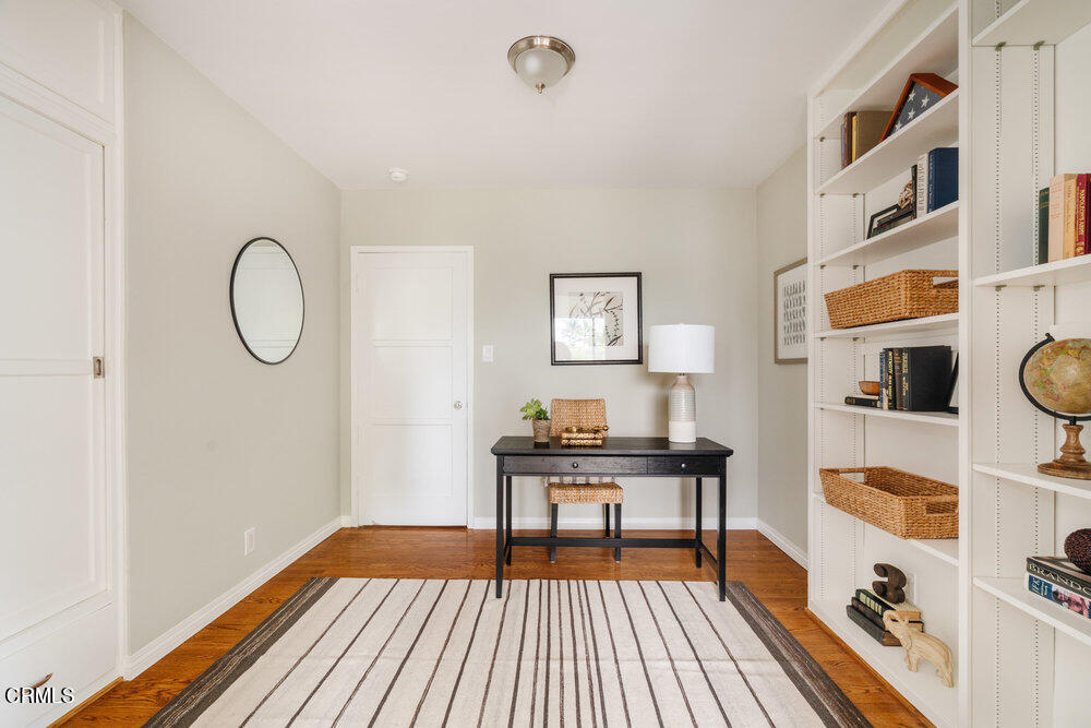 126 West Pine Street Altadena, CA 91001 - Photo 12 of 21 a view of a room with shelves and wooden floor