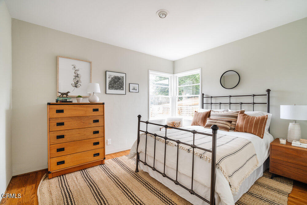 126 West Pine Street Altadena, CA 91001 - Photo 13 of 21 a bedroom with a bed and a window