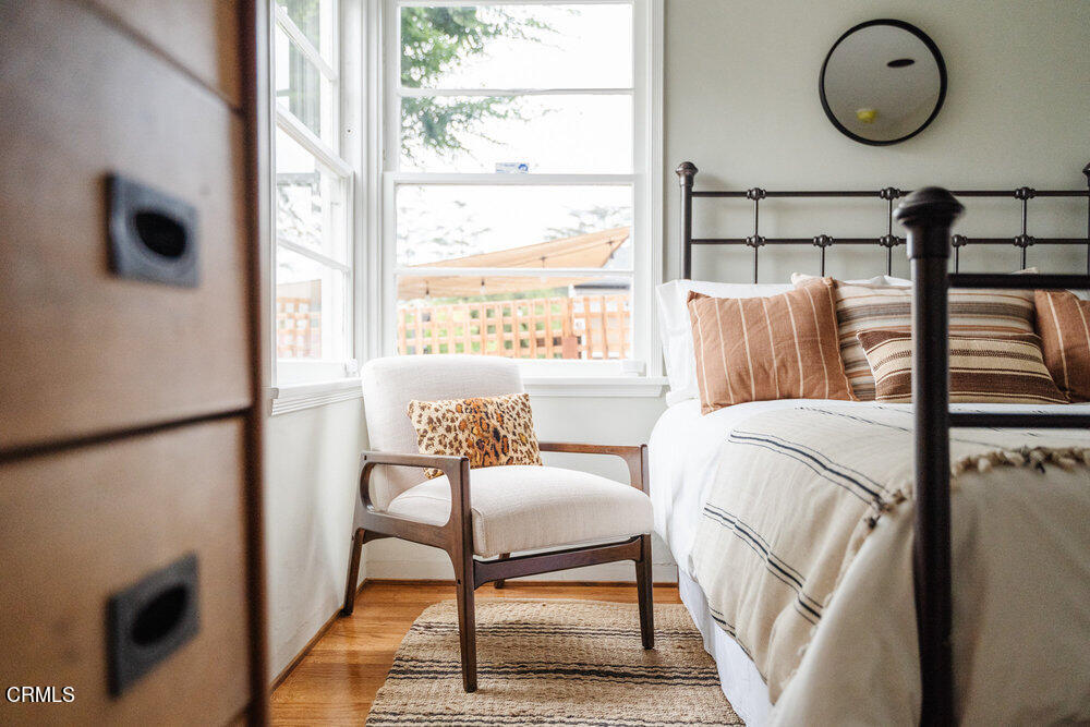 126 West Pine Street Altadena, CA 91001 - Photo 14 of 21 a living room with a window and a wooden floor