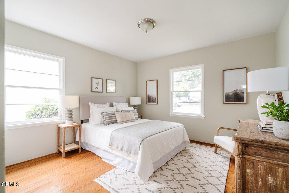 126 West Pine Street Altadena, CA 91001 - Photo 16 of 21 a bedroom with a large bed and a window