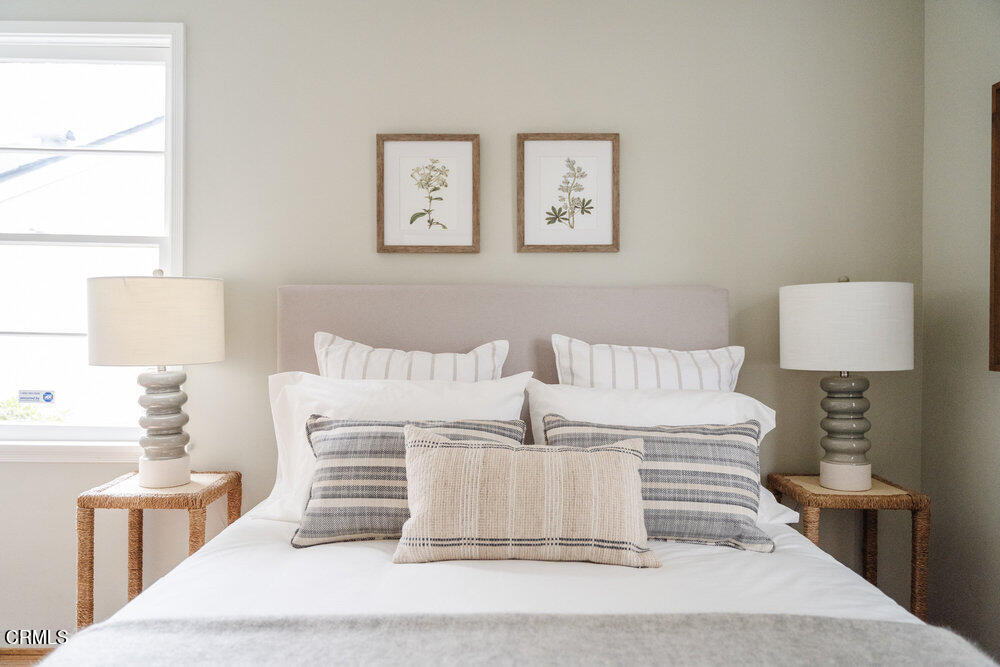 126 West Pine Street Altadena, CA 91001 - Photo 17 of 21 a large white bed sitting in a bedroom next to a window